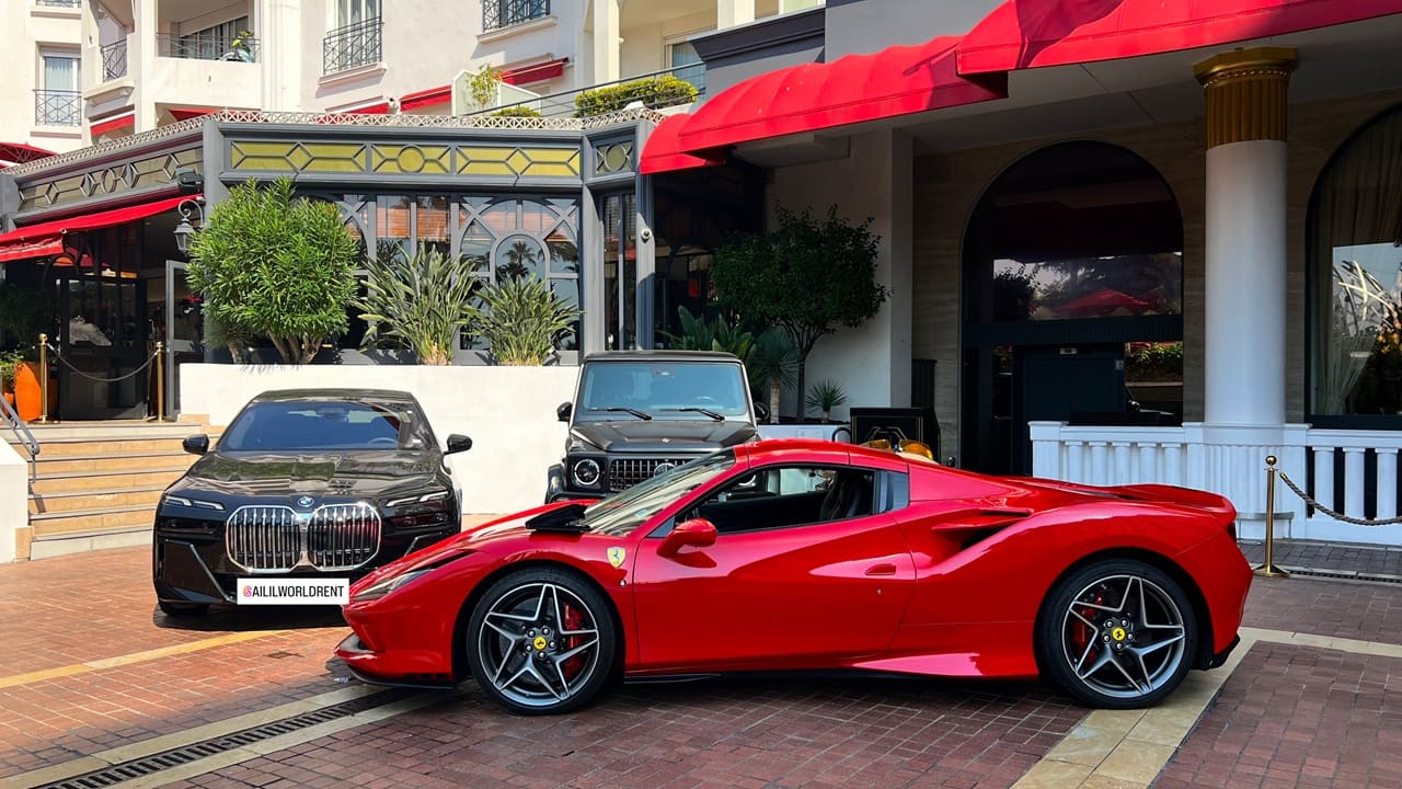 ferrari f8 spider mercedes g63 amg bmw 7 parked near majestic hotel in cannes