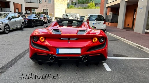 ferrari f8 spider with open roof and from back side