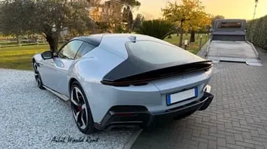 ferrari f8 spider with open roof and from back side